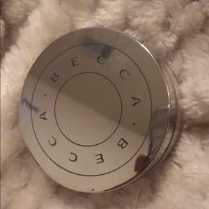 Becca mini hydra mist powder.